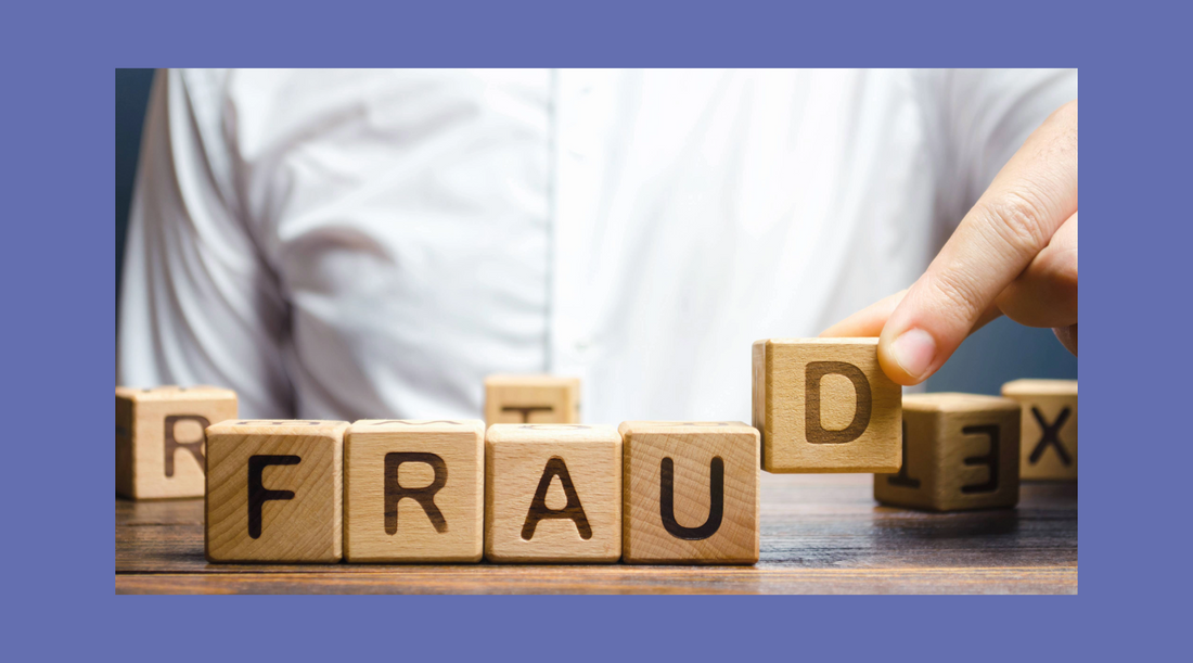 Wooden blocks spelling "FRAUD" being manipulated by a hand, symbolizing the exposure and implications of paternity fraud. Highlights the importance of accurate DNA testing to uncover the truth.