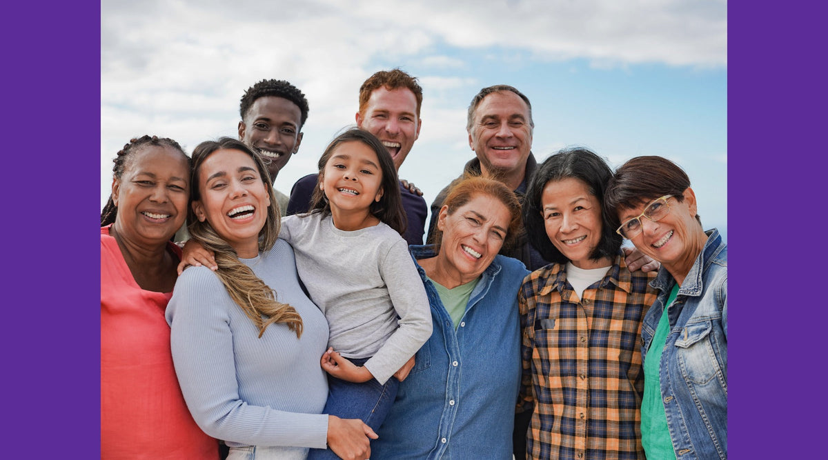 Smiling people of different ages and backgrounds together, symbolizing one human family at My Forever DNA.