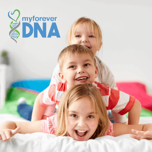 Three smiling siblings playfully stacked on each other, symbolizing the close family connections explored through Sibling DNA Genetic Testing at My Forever DNA in Omaha, NE.