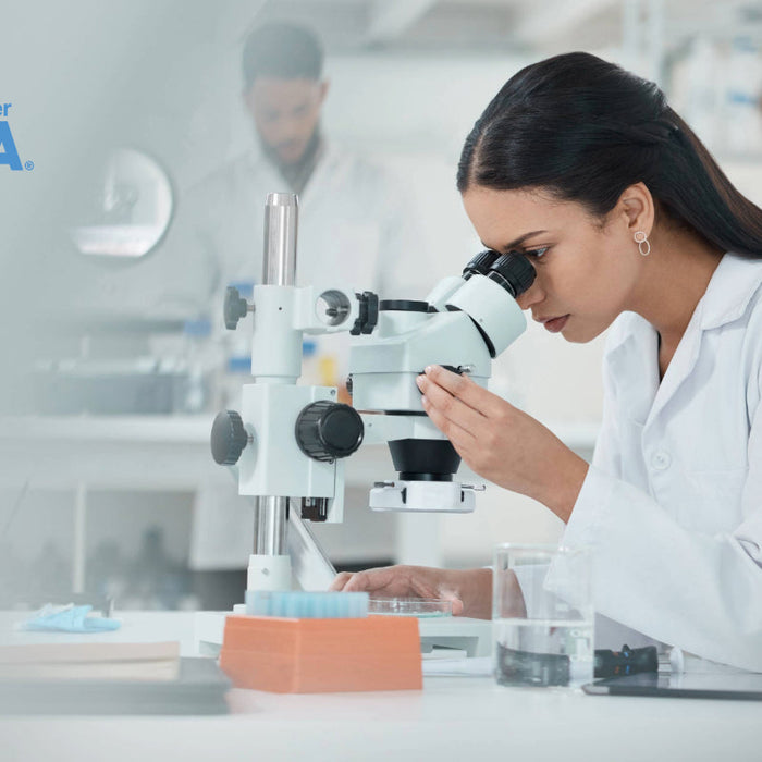 Scientist at My Forever DNA lab verifying results, showcasing the highest accreditation standards