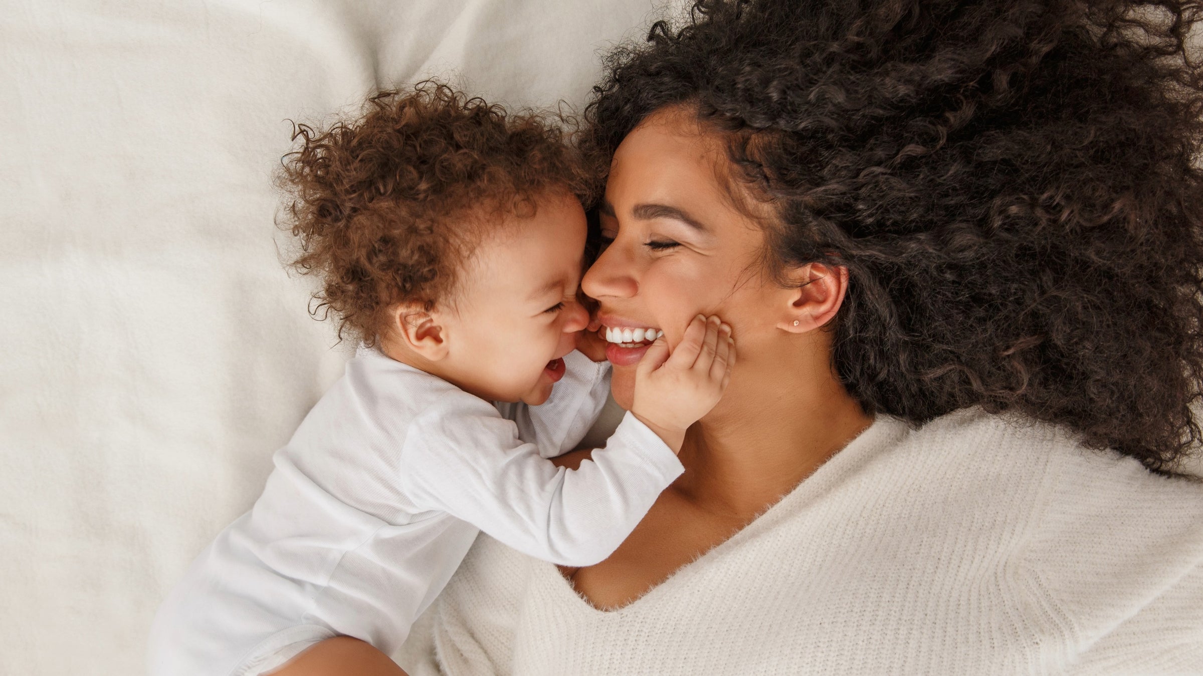 Loving mother and child smiling together - Accurate Maternity DNA Testing to determine if a woman is the biological mother, by My Forever DNA