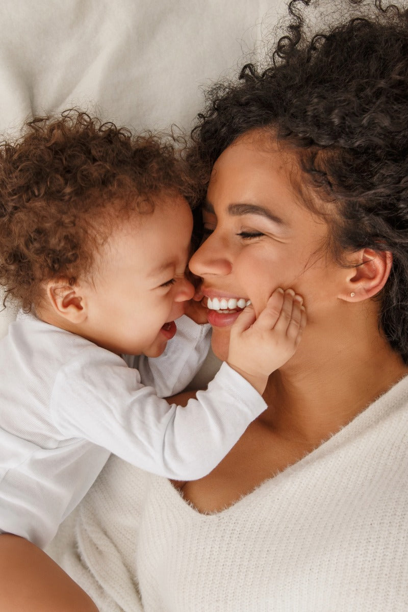 Loving mother and child smiling together - Accurate Maternity DNA Test to confirm biological relationship at My Forever DNA